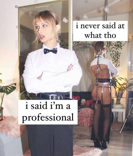 photo of a pretty blonde girl in a cater waiter outfit standing in front of a mirror showing that the back of her outfit is cut away to reveal stockings, heels and lingerie with the text 'i said i'm a professional / i never said at what tho'