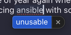 Screenshot of text on macOS saying ansible. Underneath is a correction box of macOS suggesting to replace it with unusable.