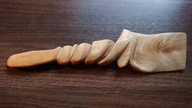 Wood spatula with twisty handle