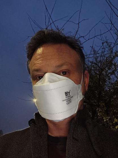 Man wearing FFP3 mask.