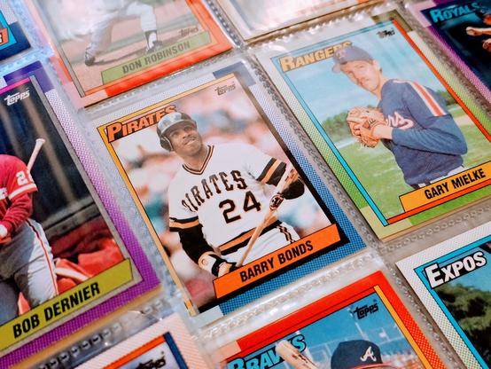 A closeup of 1990's Topps Baseball cards - In the centre of the image is 'Barry Bonds (Pittsburgh Pirates)'.