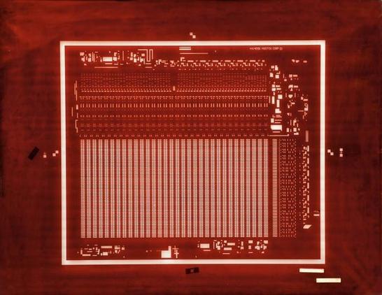 The same "rubylith" process zoomed out, showing regularly-spaced block of memory for a RAM mask.