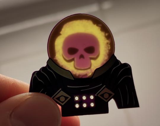 mysterio with filled bulb, back light is on, eyes are dark and skull brighter