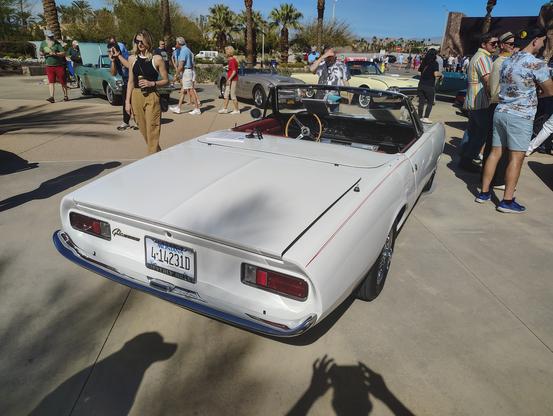 The rear of the Ghia is squared off, almost like a Kamm-back, and a little reminiscent of the last few years of the Alfa Romeo sport roadster. The license plate is from Montana, but the chrome frame around it reads "Ghia Beverly Hills."  A chrome script to the left of the plate reads "Ghia 450" in which the "450 is block lettering reversed out of a chrome surround.