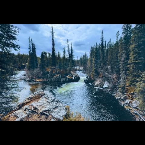 Landscape photography in color of a little waterfall in the forest , British Columbia, Canada