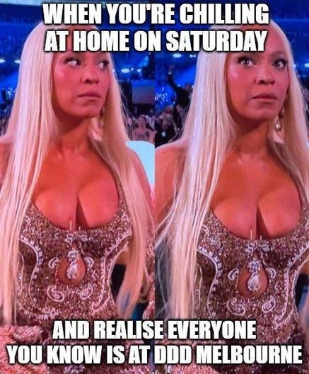 A meme featuring two side-by-side images of Beyoncé at an awards show. In the first image, she looks calm and neutral. In the second image, she looks slightly alarmed and surprised. The text reads: “WHEN YOU'RE CHILLING AT HOME ON SATURDAY AND REALISE EVERYONE YOU KNOW IS AT DDD MELBOURNE.” The meme humorously captures the feeling of missing out on a major event.