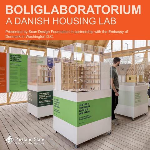 PSU Architecture flyer with bright orange border with white text above color photo showing three white presentation cases holding wooden scale models set upon light wooden floor with a young man in black jeans, gray tshirt and sneakers looking into one model