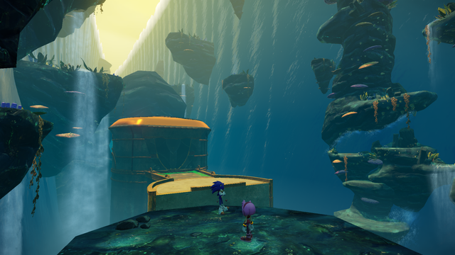 a screenshot from Sonic Boom: Rise of Lyric. Amy and Sonic stand in a cave between two walls of waterfall, from a slightly different angle.