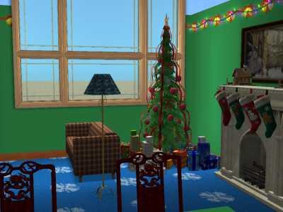 Was doing a living room with mostly stuff from the Holiday Stuff pack. Fireplace to the right, tree in the center and the couch to the left. There is a dining table in the foreground and a multi story window in the back. I was fascinated with them since these were not a thing in TS1.