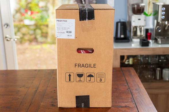 The side of the box, which includes carry handles.