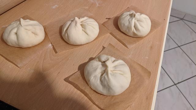 3 raw nikuman

They look like small buns and are filled with minced meat and other ingredients