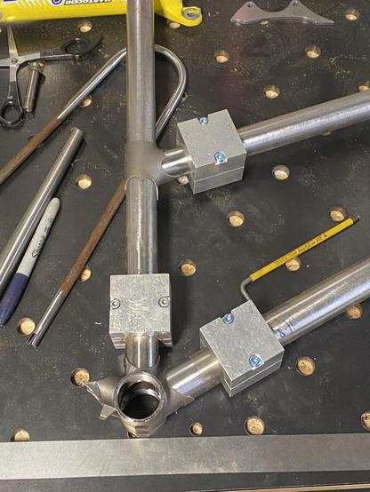 Steel tubes as part of a lugged step through bicycle frame 
Showing the junction at bottom bracket, seat tube, down tube and top tube