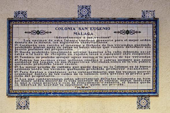 A panel made of ceramic tiles displaying a list of rules for neighbourly conduct in Spanish