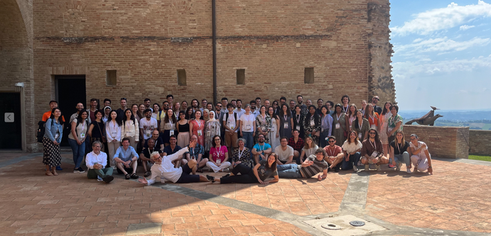 All 60 participants and 20something tutors & assistant tutors of ISWS 2023 assembled in a group picture in the shade of the Bertinoro castle court yard.