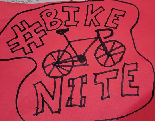 Terrible looking artwork done on pink construction paper which looks like a 5 year old got to a Sharpie.