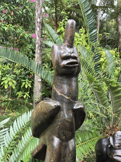 statue giving the finger
