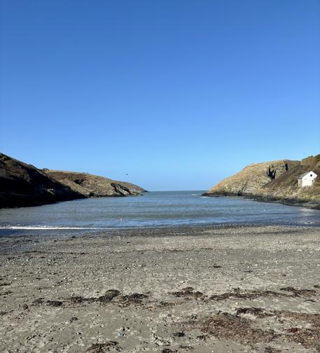 Clear blue skies looking out across Abercastle beach.
