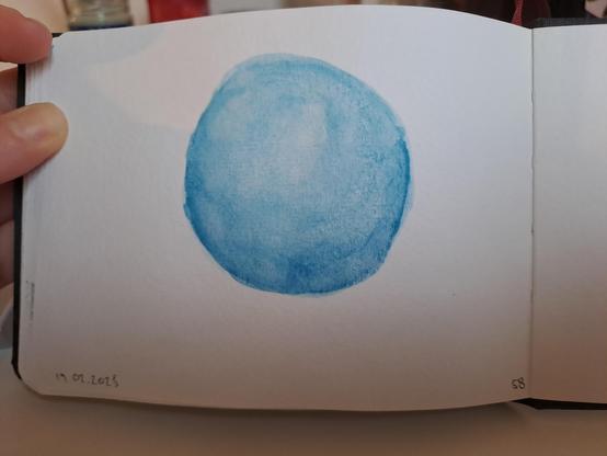 A watercolour of a blue sphere. An attempt was made to get the shading accurate, but it's not