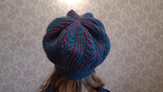 Photo of the same hat from the back. More of the hat's creases are visible.