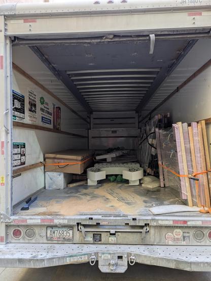 The back of the truck after starting the unloading process