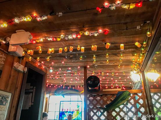 Whimsical signs on the wall of The Fish House, Key Largo.