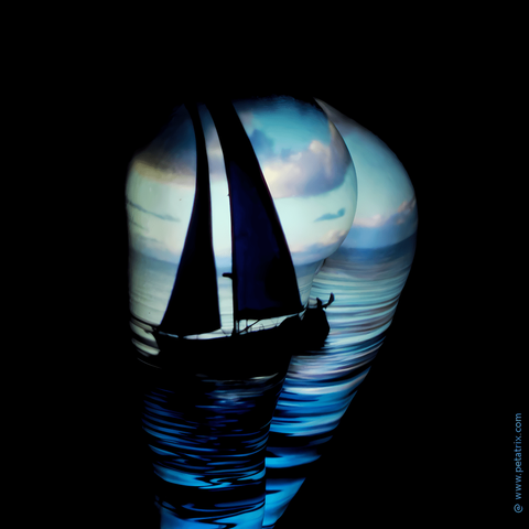 projection of a sailing ship on a female bottom, the torso is covered by the sea