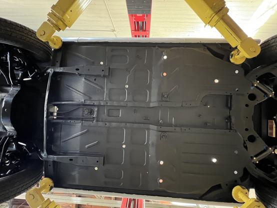 Underside of restored 1964 Corvair, prior to reassembly