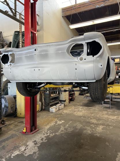 Wheels and steering linkage installed temporarily in 1964 Corvair