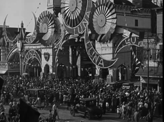 A black and white still from the film Speedy showing the entrance to LUNA PARK, Coney Island