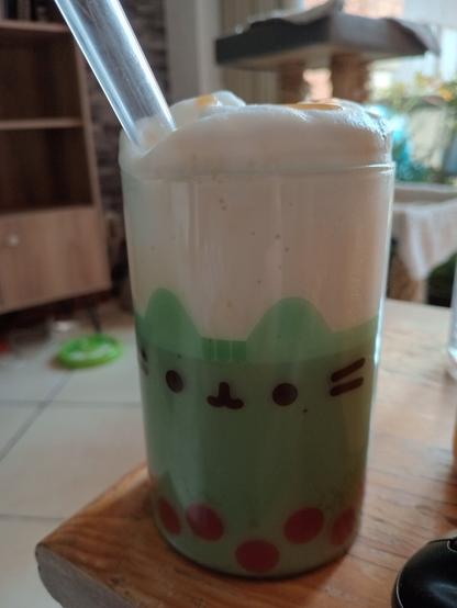 Caramel iced coffee in a Pusheen glass