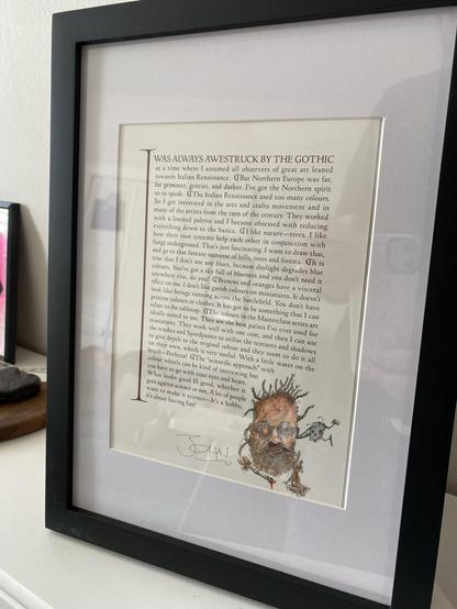 Note from John Blanche framed. It talks about art and paints. It finishes on a “ it’s a hobby, it’s about having fun”