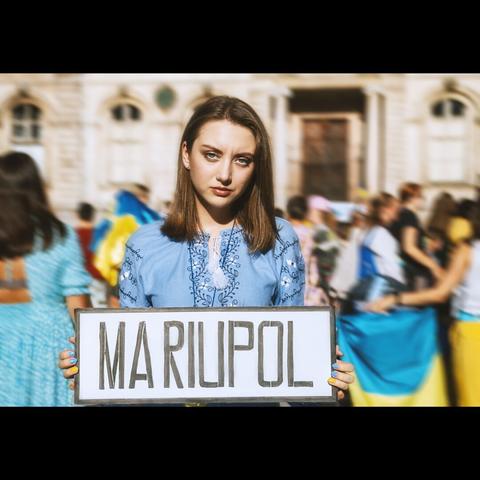 Photojournalism of an ukrainian woman from Mariupol, in a demonstration, Lyon France