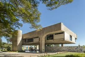 Brutalist villa in Brazil. Looks like it’s floating on concrete. Ground floor is glass all around.