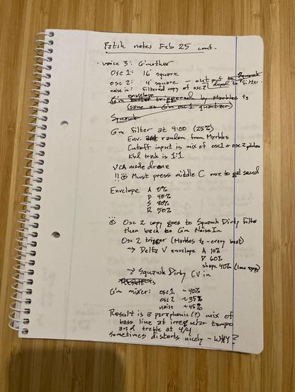 Handwitten notes describing a modular synthesizer patch. Lined white notebook page on a bamboo table.