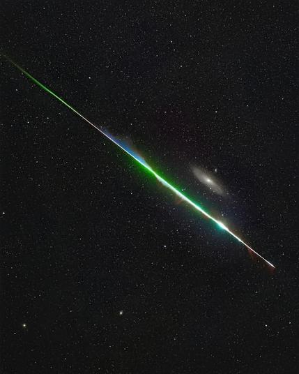 A photographer set out to capture the Andromeda Galaxy but instead witnessed a breathtaking cosmic event—a meteor streaking across the sky in a radiant blaze of colors. A fleeting moment of brilliance against the backdrop of a timeless galaxy, proving that the universe always has surprises in store.