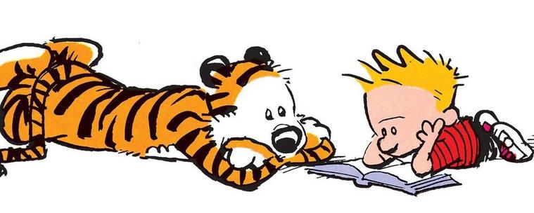 The comic-strip characters Calvin and Hobbes, by William Boyd Watterson. Calvin is a small boy with yellow spiky hair and a red-and-black striped t-shirt, black trousers, and red-and-white sneakers; Hobbes is a tiger. In this image Calvin and Hobbes are lying on their stomachs: Calvin is reading a book, and Hobbes is lying beside him, resting his head on his – let's face it, arms.