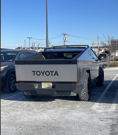Someone who put "TOYOTA" on the back of their Cybertruck, in what looks like an attempt to not be a Tesla