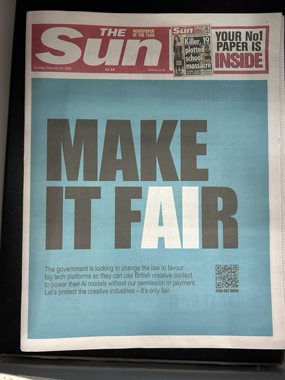 A newspaper front page, with the headline “Make it Fair” in black text, with the Ai in the word fair highlighted in white.
