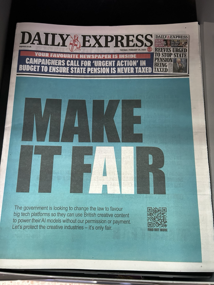 A newspaper front page, with the headline “Make it Fair” in black text, with the Ai in the word fair highlighted in white.
