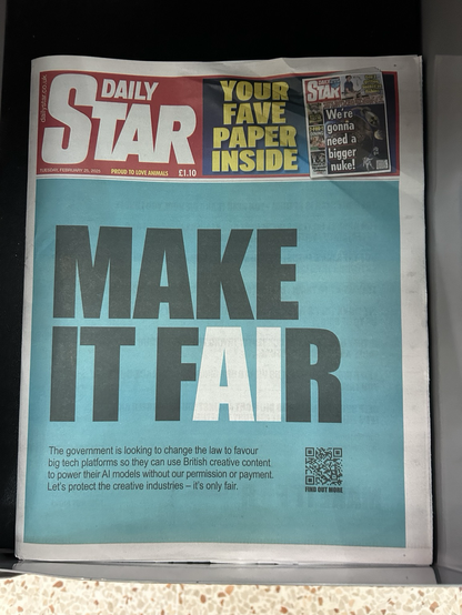 A newspaper front page, with the headline “Make it Fair” in black text, with the Ai in the word fair highlighted in white.