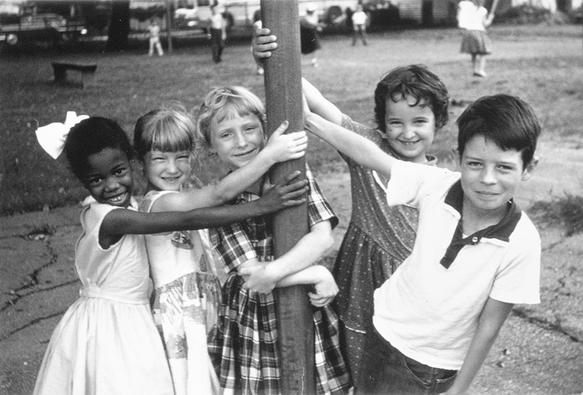 Photo of Ruby Bridges with friends not long after she desegregated a public school in New Orleans.