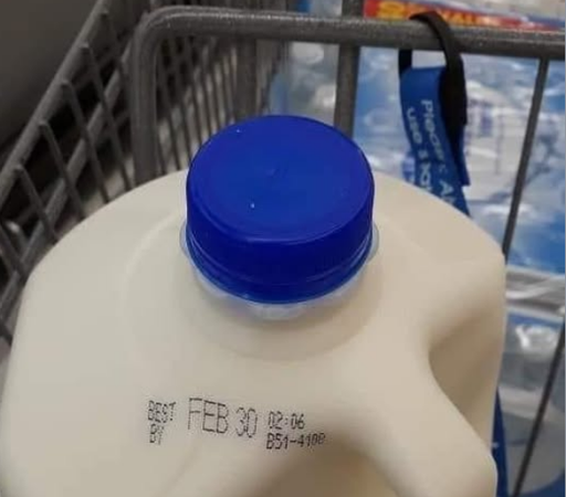 Color image of a milk jug with the expiration date printed as "FEB 30" - a date that will never occur.