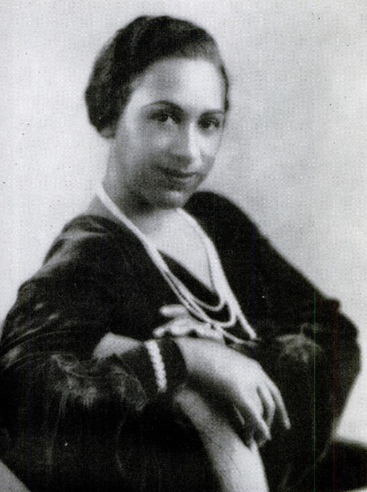 Constance Ridley Heslip, from a 1942 issue of The Crisis; a Black woman wearing a dark dress and strands of pearls