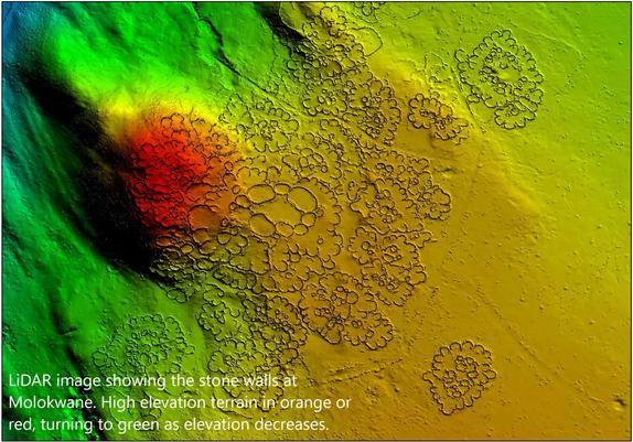 LiDAR image showing the stone walls at Molokwane. High elevation terrain in orange or red, turning to green as elevation decreases.