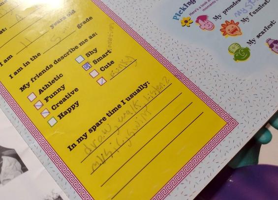 Another colorful page. This student has filled out a section with attributes about herself and her favorite activities. She says her friends describe her as funny, creative, smart (sometimes), and funky.