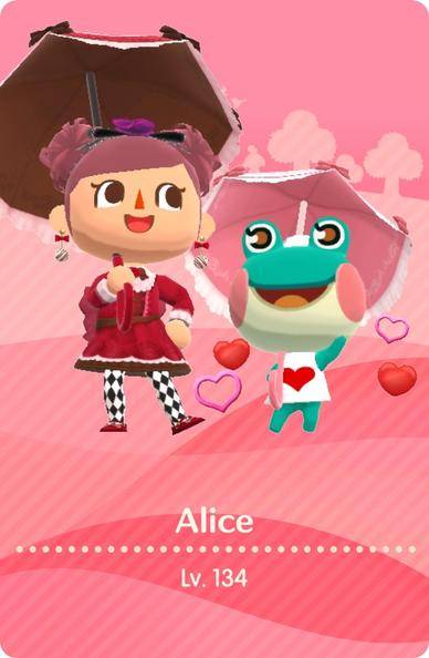 My Camper Card, featuring a pink background and Lily the Frog wearing a heart t-shirt. I’m dressed like a red and black goth style Lalaloopsy doll. We’re both carrying frilly umbrellas and are surrounded by little floating red hearts.