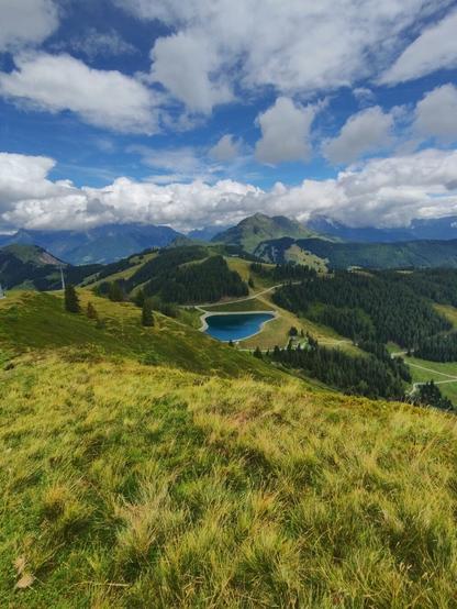 View from the Reiterkogel and the reservoir pond Wetterkreuz beneath