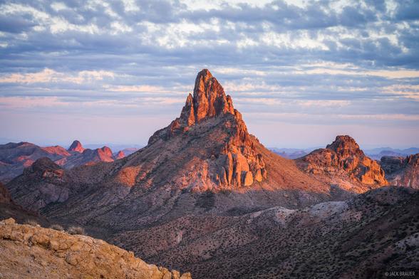 Sunset light on a striking spire in the Kofa Mountains of Arizona.