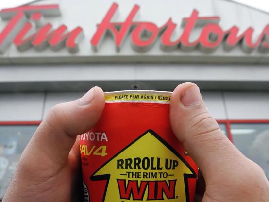Tim Horton's Roll-Up cup showing their "PLEASE PLAY AGAIN" message - I've won NOTHING... not even a donut or coffee