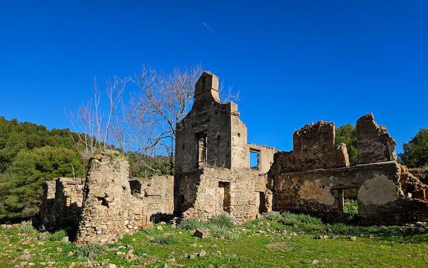 A wider view of the same ruins